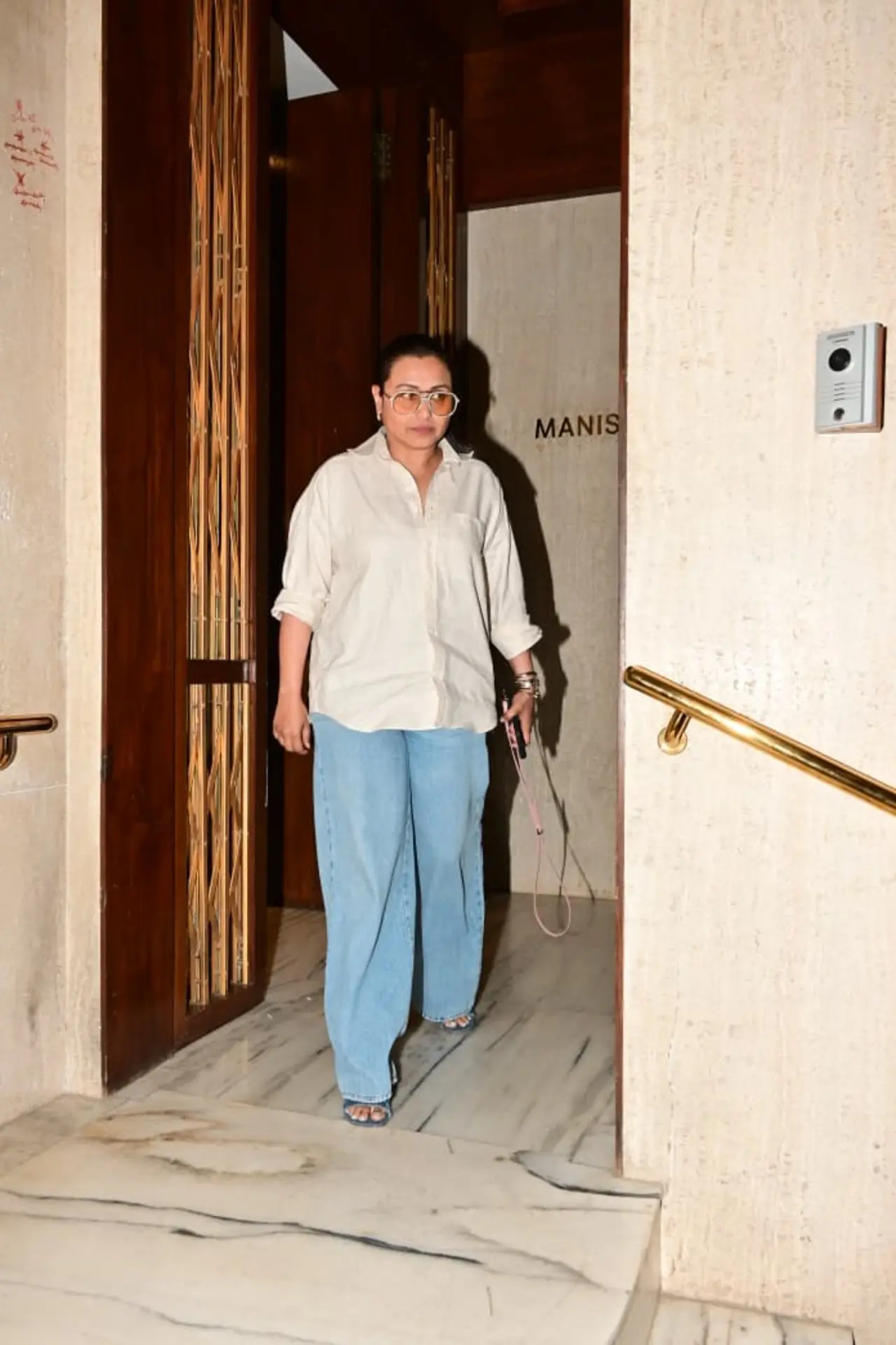 Rani Mukerji was spotted in a casual yet chic look, pairing a crisp white shirt with classic blue jeans.